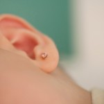 Close-up of baby's ear, cropped